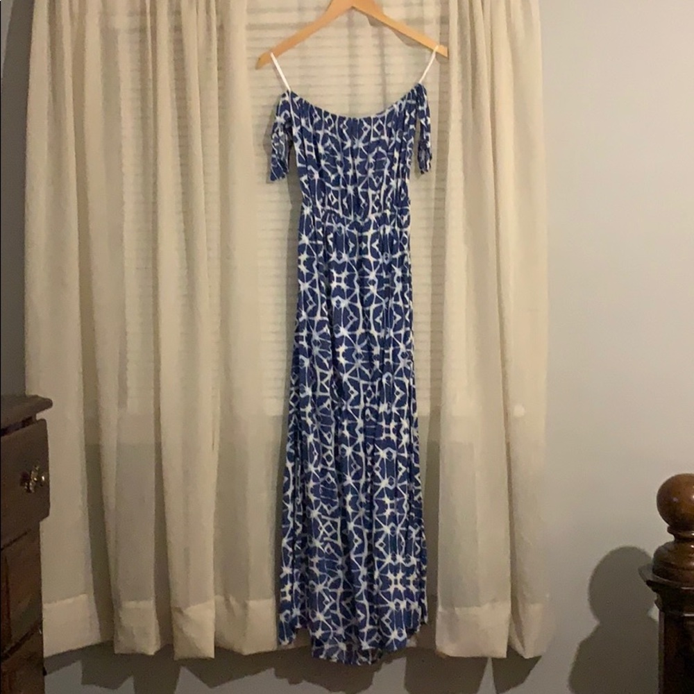 Blue and white off the shoulder dress.